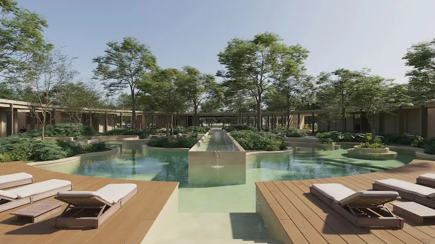 Piscina con camastros en Nórtico Residencial Merida