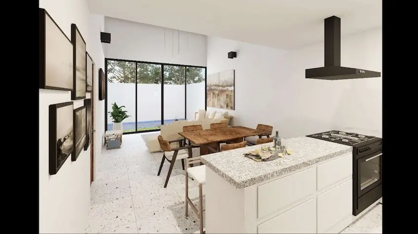 Cocina y comedor con mesa y sillas en Casa Sevilla Playa del Carmen