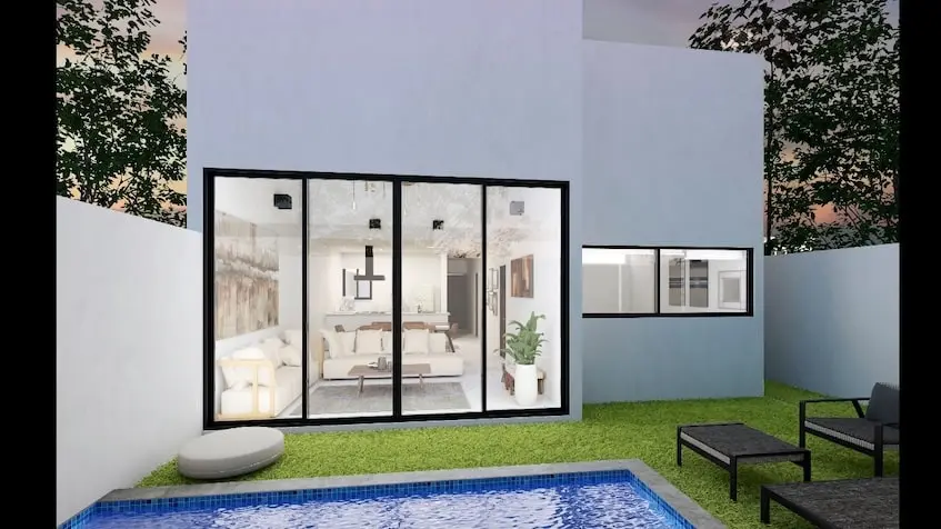 Una casa con piscina y pared de cristal en Casa Sevilla Playa del Carmen