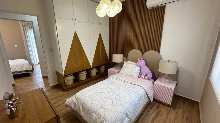 A bed with a cuddly toy in Samala Playa del Carmen