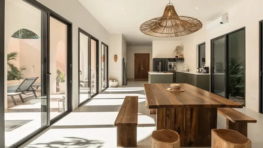 Dining room with pool view at Casa Tabarka Tulum