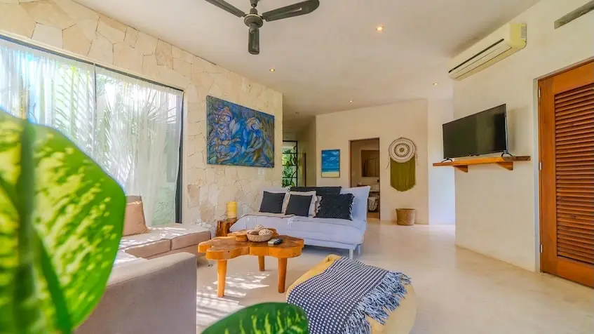 Interior of a house with living room at Casa Caramelo Tulum