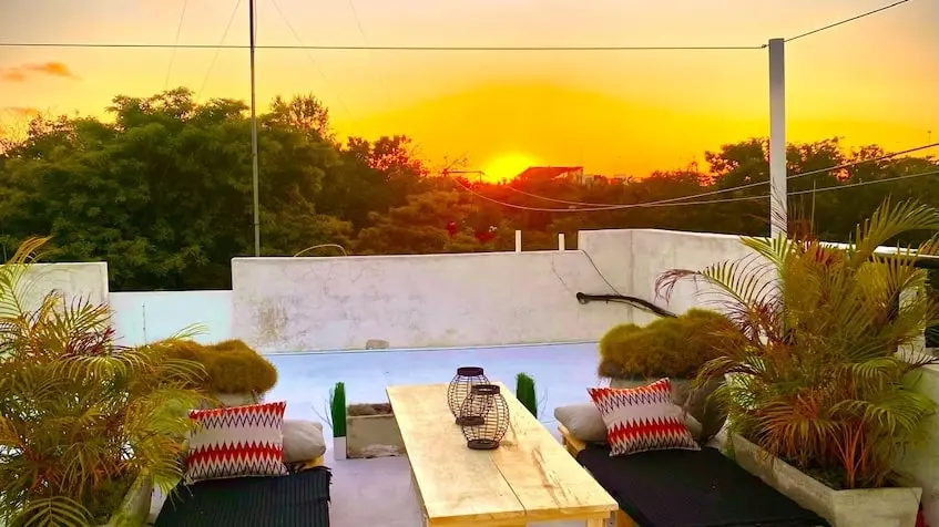 Sunset on the rooftop at Casa Caramelo Tulum