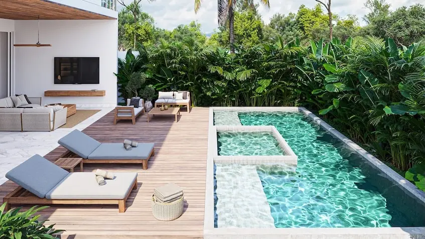 Une piscine avec des chaises longues à la Villa 8 Lumina Playa del Carmen