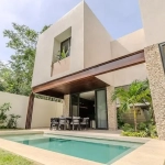 Rear facade of the Casa Arenas Valenia pool in Playa del Carmen