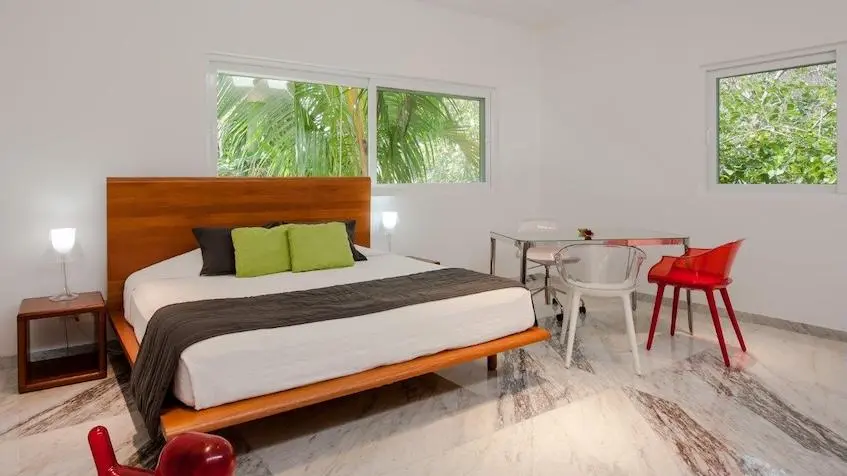 Piscine avec jardins à la Villa Belfiore Playacar Playa del Carmen