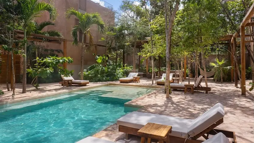 Common area with lounge chairs at Kokoon Villa Tulum