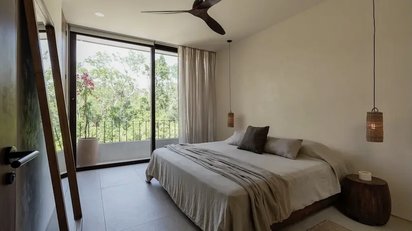 Interior de una recámara en Villa Riviera Tulum