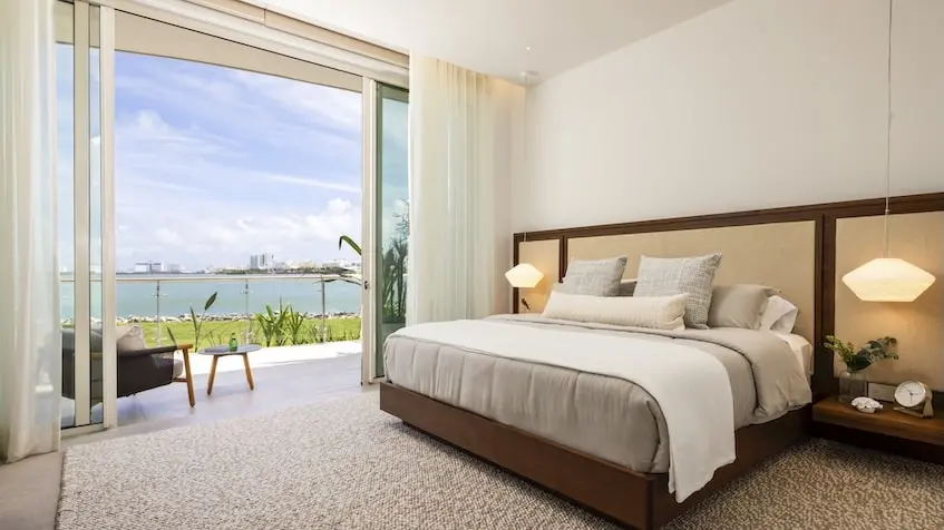 Recámara vista laguna en One Laguna Residences Cancún
