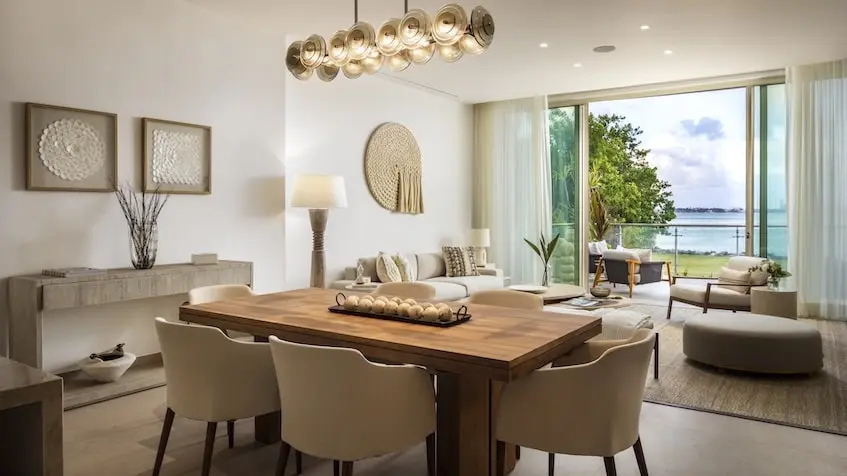 Sala comedor con Vista a la laguna One Laguna Residences Cancún