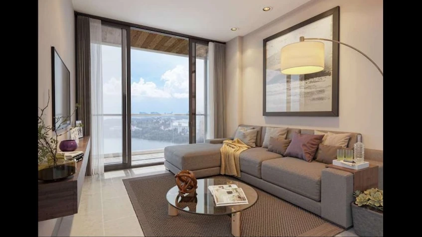 Living room and TV at Azurea Marina Residential Cancun