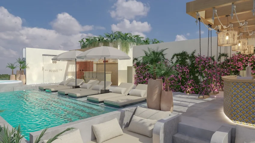 Piscine avec chaises longues à Portofino Playa del Carmen