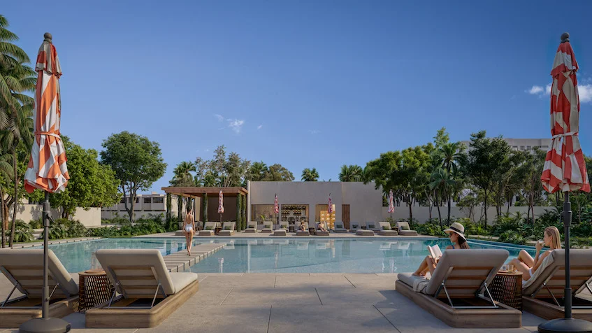 Pool loungers at Akora Residencial Playa del Carmen