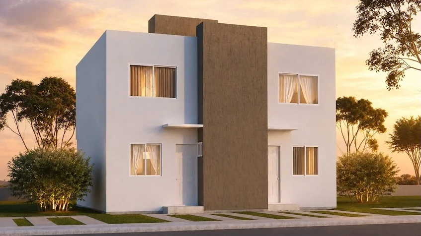Vista exterior de casa incluye una fachada de dos niveles en tonos blanco y café, amplias ventanas, un pequeño jardín delantero, áreas verdes de Vía Verde Playa del Carmen.