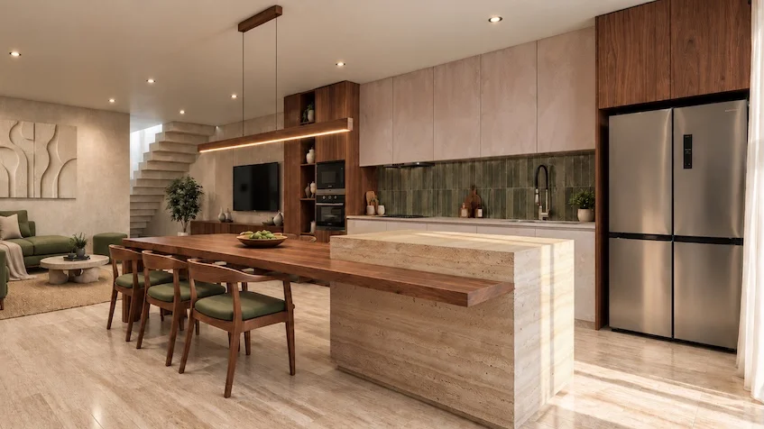 Diseño interior de cocina y sala-comedor que incluye una isla central, gabinetes, refrigerador, una mesa con sillas, además de un sofá al fondo de Entre Bosques Mayakobá Playa del Carmen.