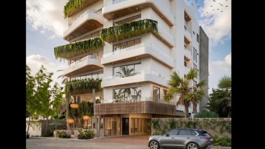 Fachada exterior que incluye un diseño arquitectónico contemporáneo de varios niveles, balcones con jardineras colgantes, acabados de madera, iluminación cálida y un vehículo estacionado de Sensum Puerto Morelos